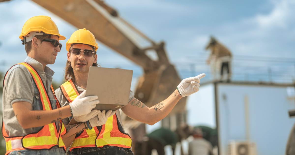 construction workers on site with equipment