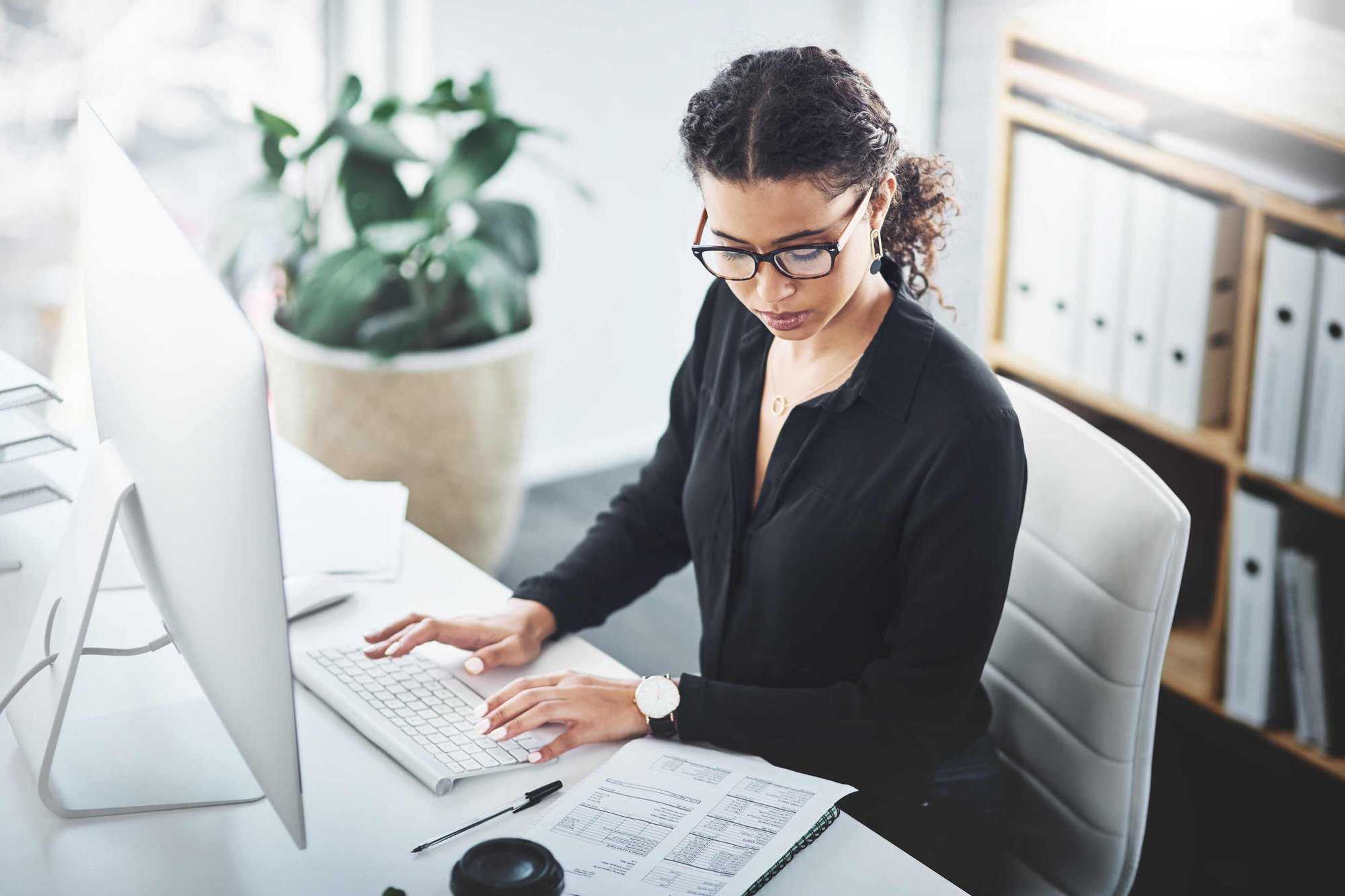 Benefits Broker looking at an employee list for ACA reporting