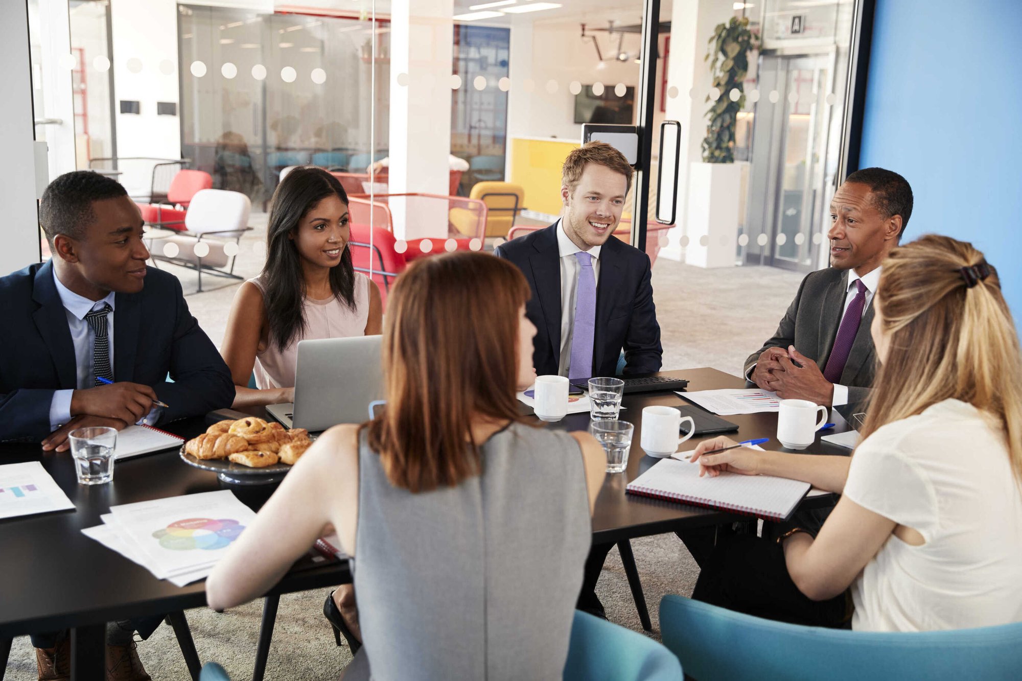 Colleagues working together in HR and Finance