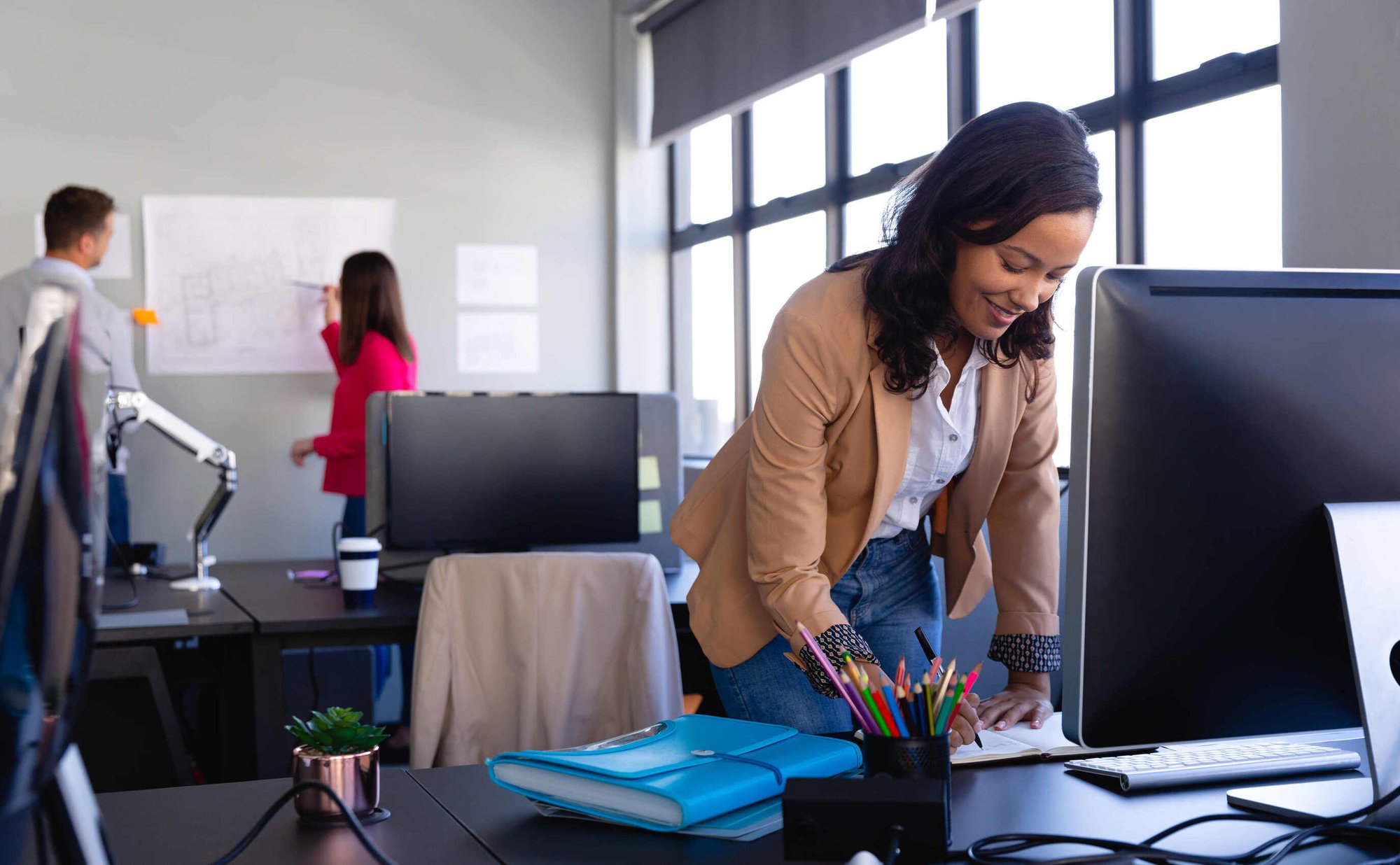 Woman working on computer in office