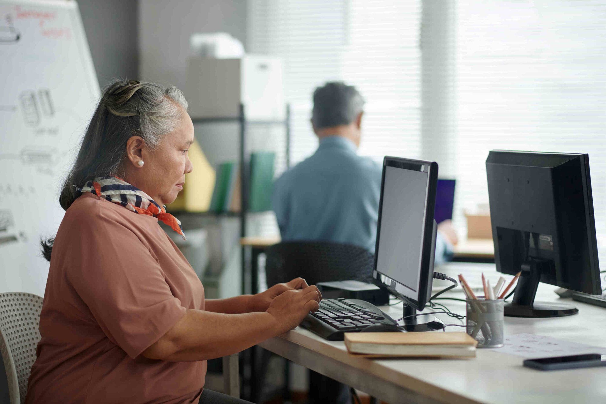 Woman working on ACA Filing on her computer