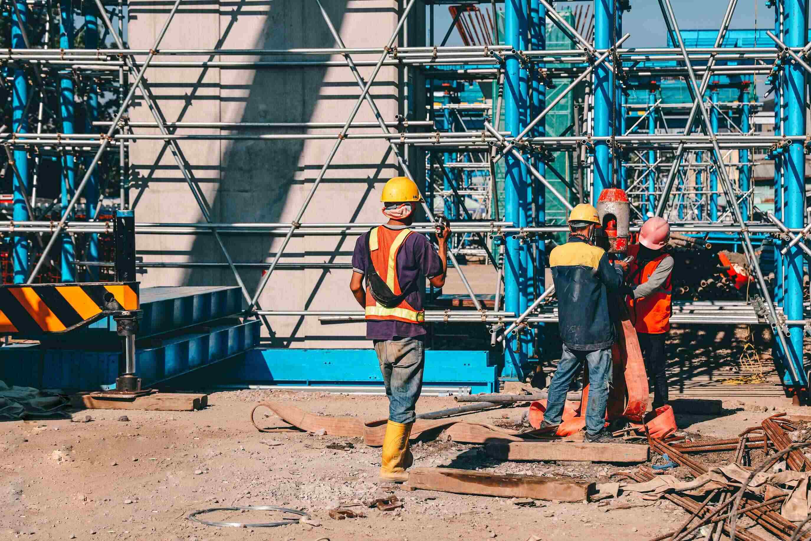 multiple workers at a construction site