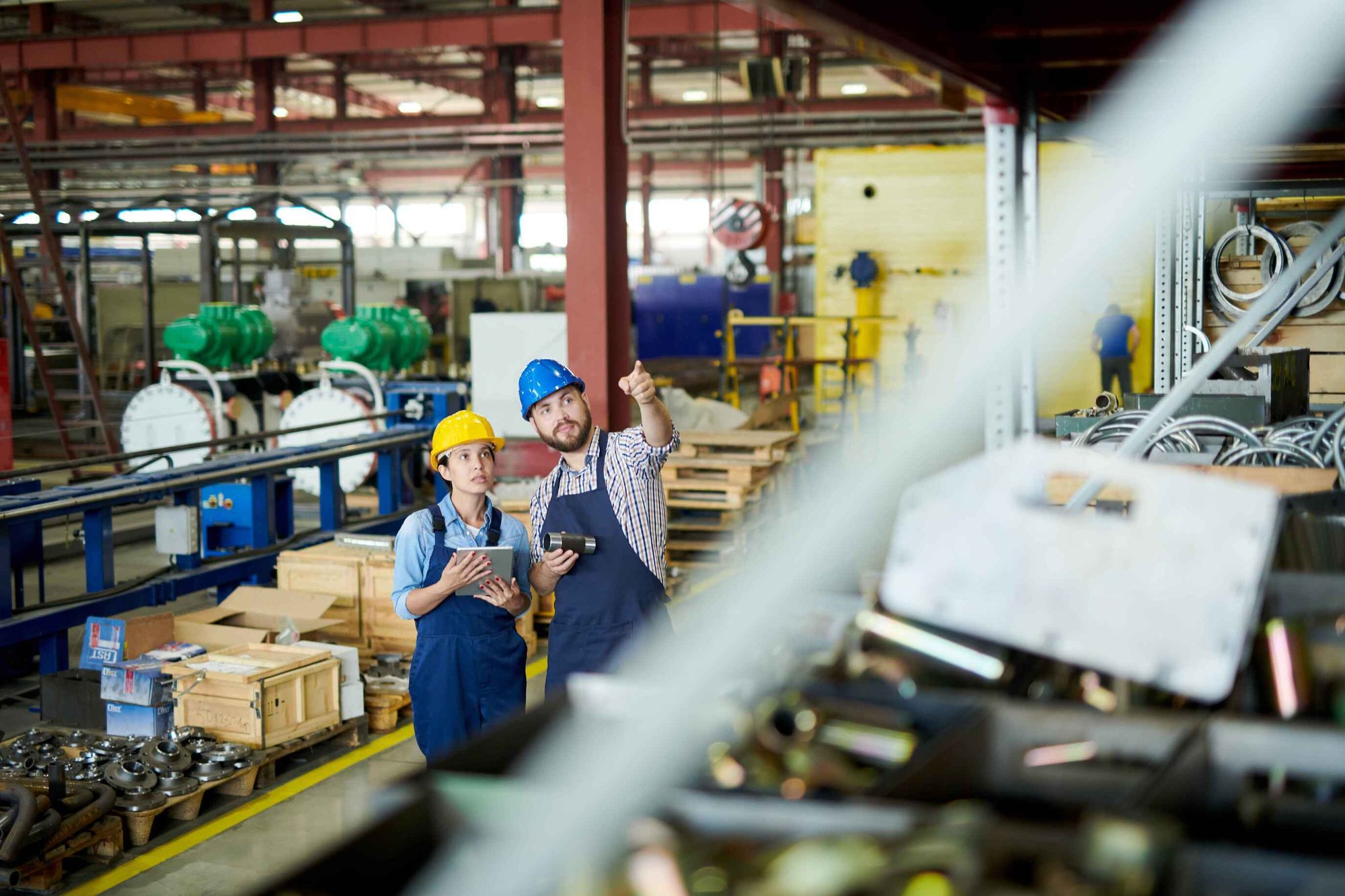 Manufacturing Warehouse Worker Pointing