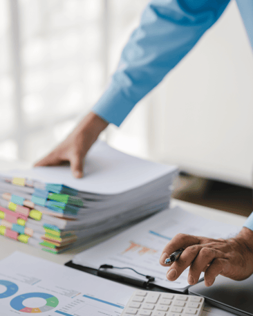 auditor with data, files, and calculator