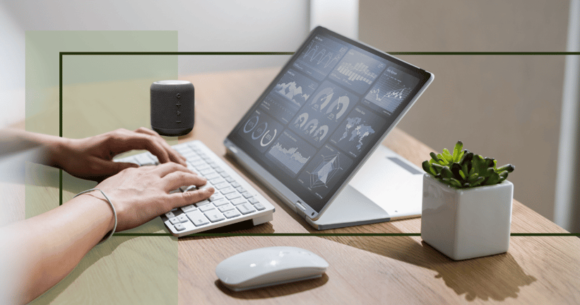 connecting payroll data with a laptop and keyboard in office