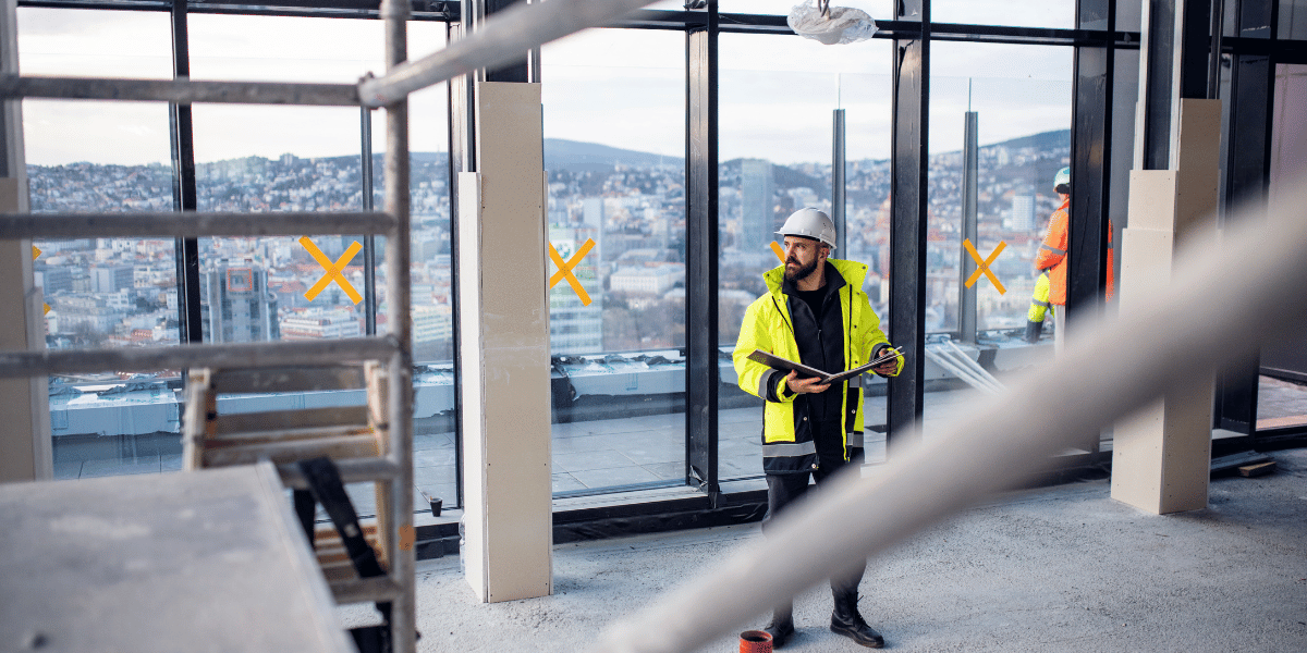 decorative: foreman evaluating office construction site decorative: foreman evaluating office construction site