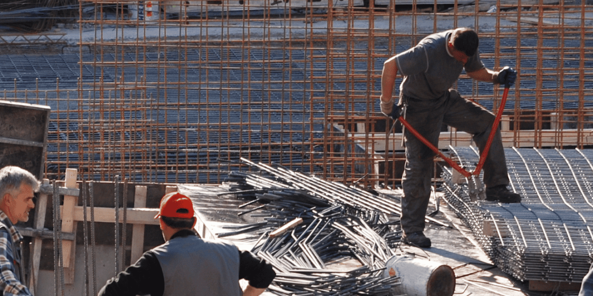 construction workers working with rebar on site