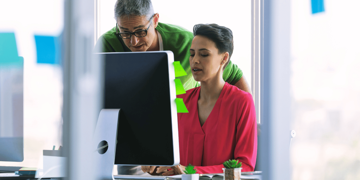 decorative image: two payroll employees decorative image: two payroll employees