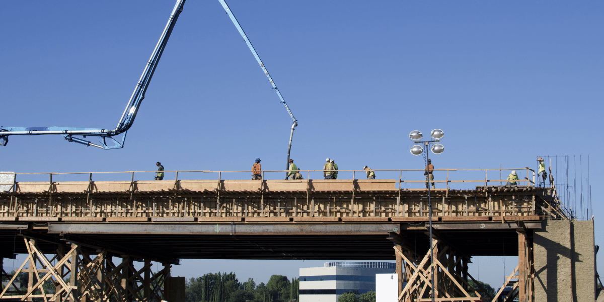 Construction crew working on a bridge. Construction crew working on a bridge.