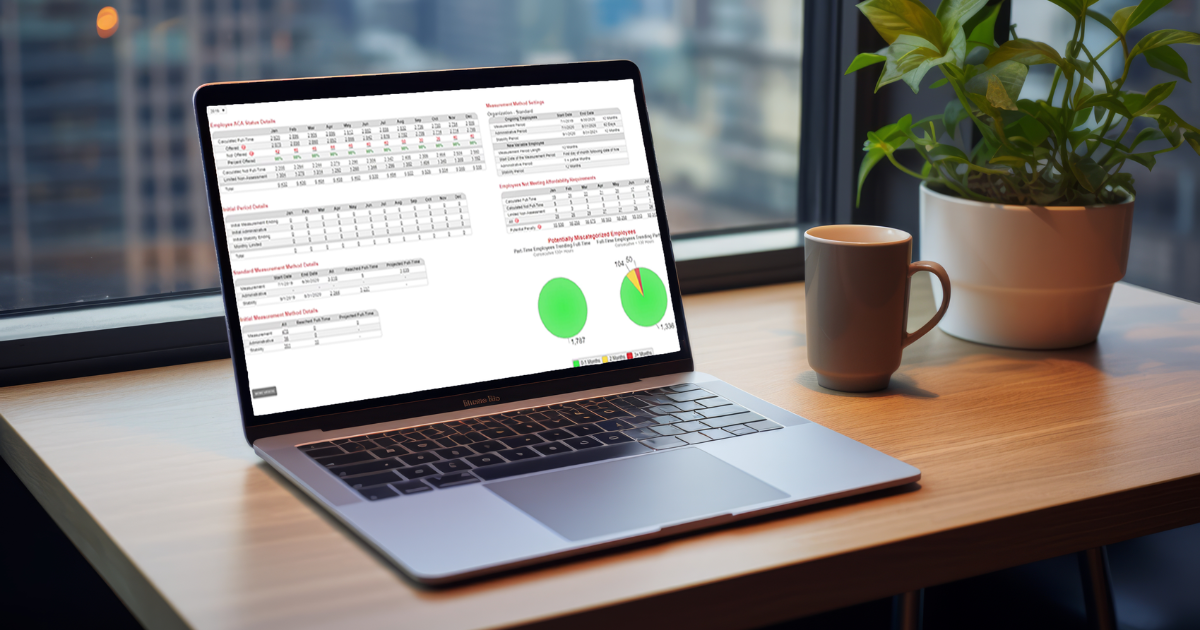 ACA Reporter software solution on a laptop screen in an office with a cup of coffee and a plant.
