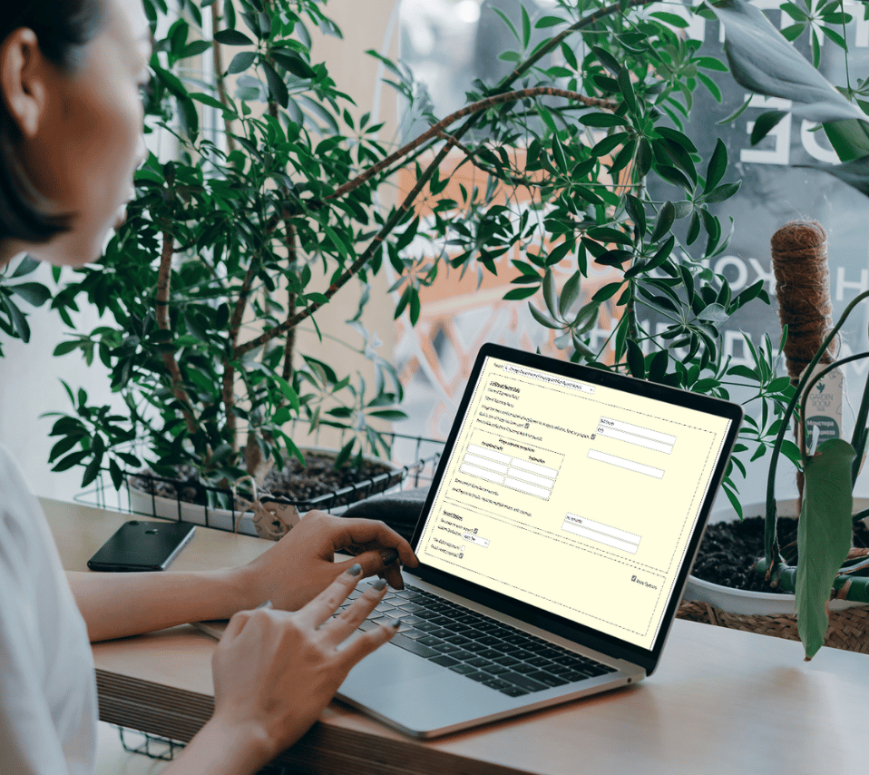 certified payroll reporting software on laptop