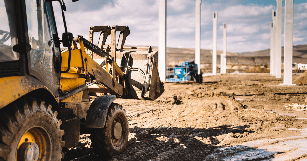 heavy construction equipment on construction site. heavy construction equipment on construction site.