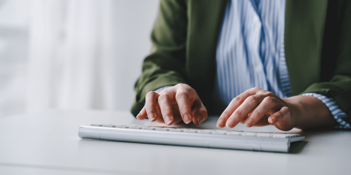 decorative: hands on a keyboard filing certified payroll reporting forms decorative: hands on a keyboard filing certified payroll reporting forms