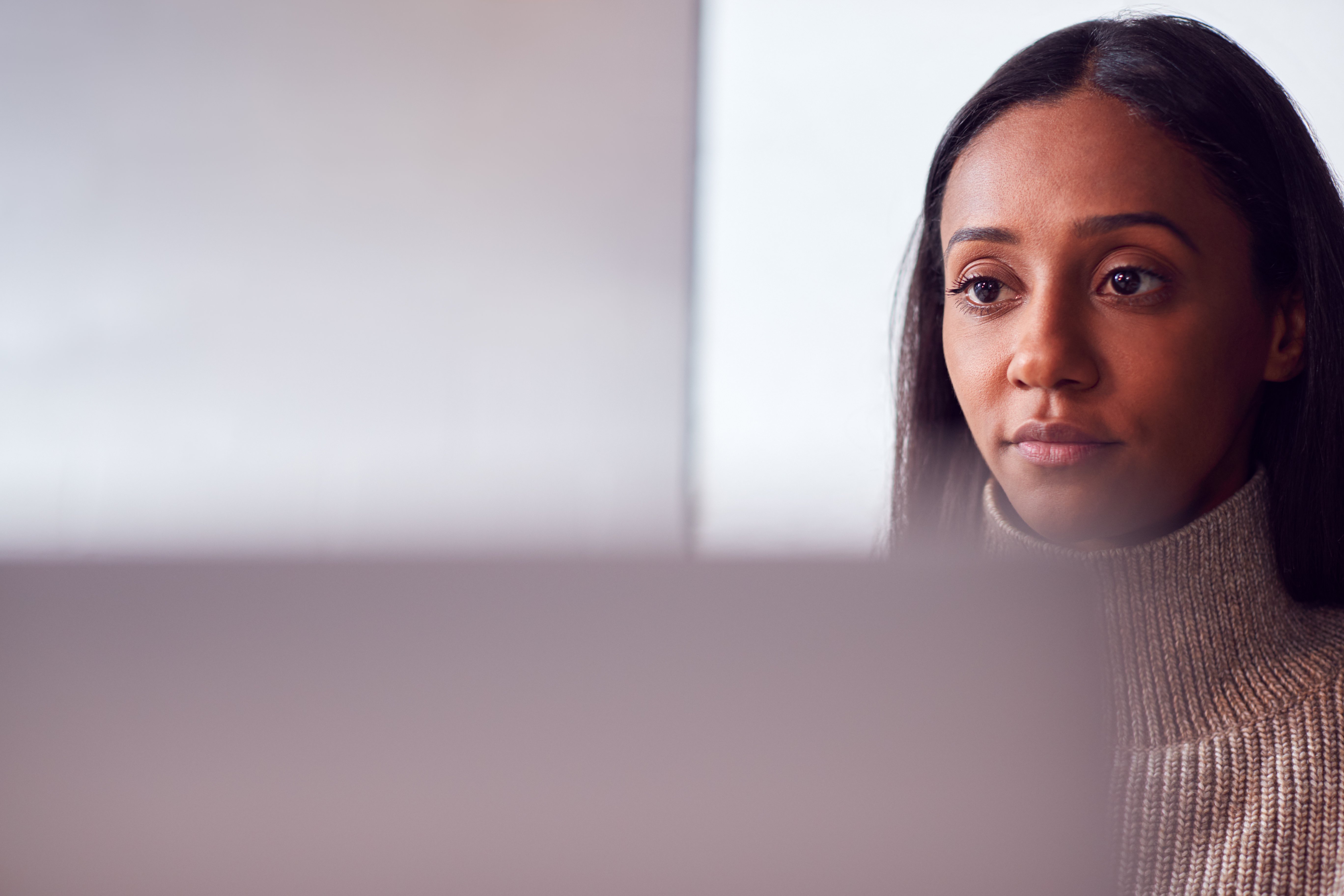 business woman looking at computer 